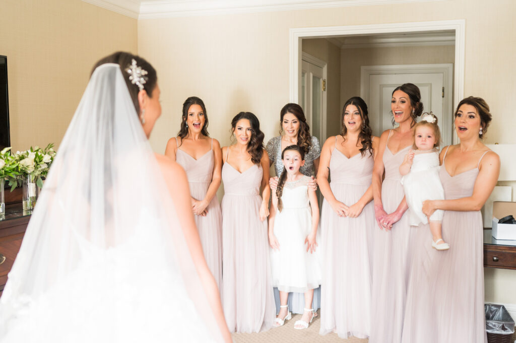 bridesmaids seeing bride for the first time • How to plan a Bridesmaids First Look • Pittsburgh Weddings