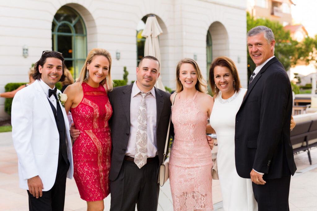 guests smiling at a cocktail hour at nemacolin • Nemacolin Woodlands Resort Weddings - Luxury Events Photos