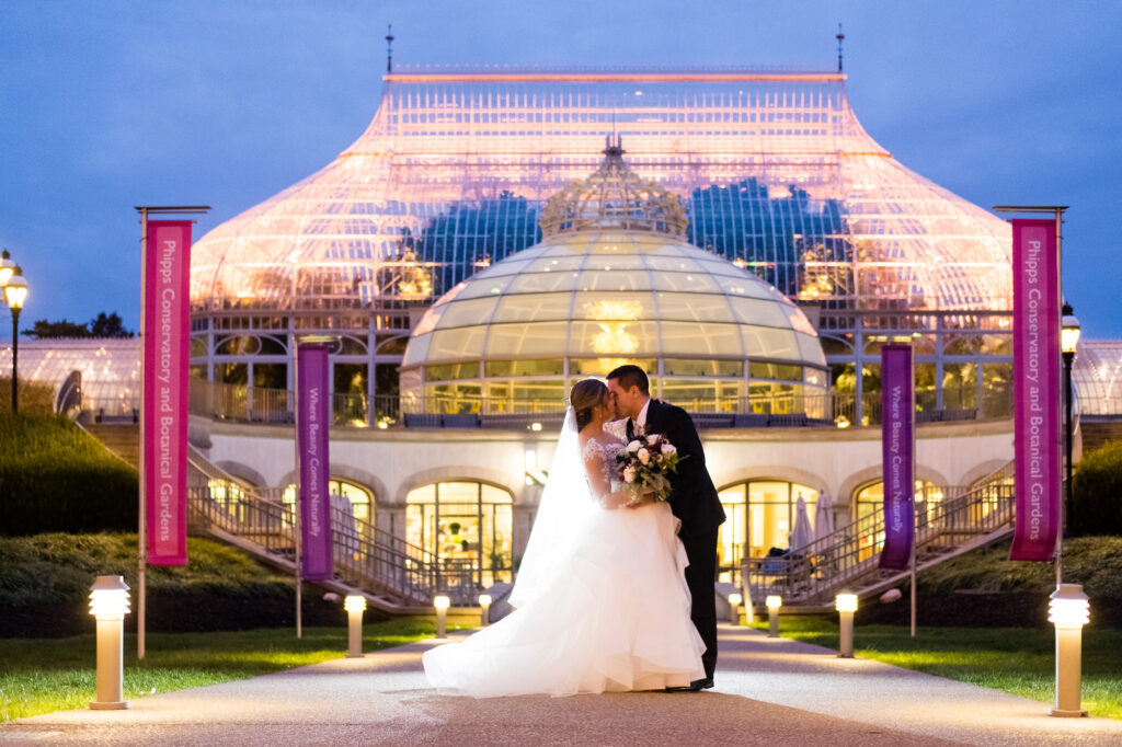 night photo in front of phipps conservatory for a wedding • Phipps Conservatory Weddings