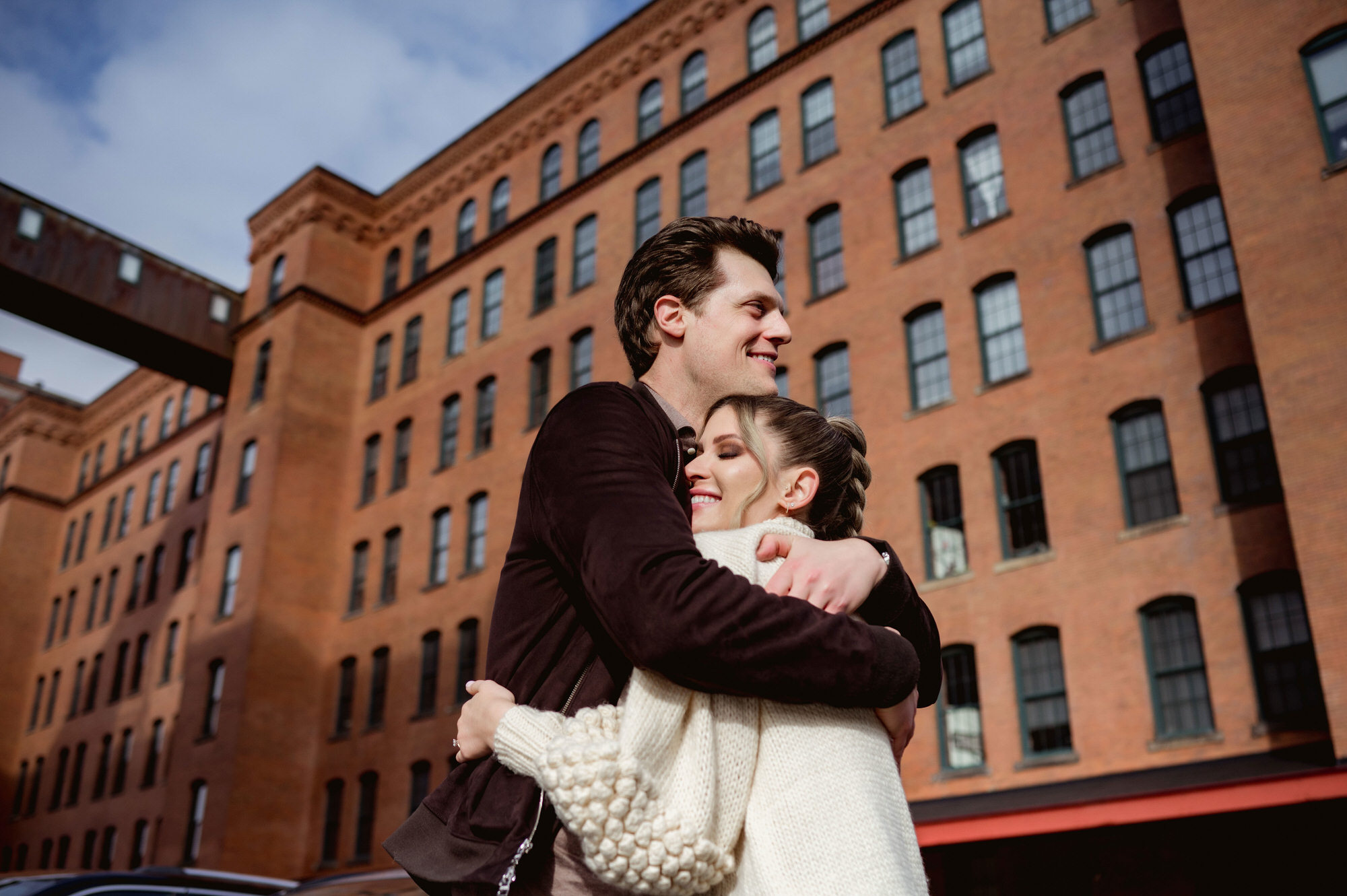 engaged couple hugging after proposal • Pittsburgh Surprise Proposal Photography | Engagement