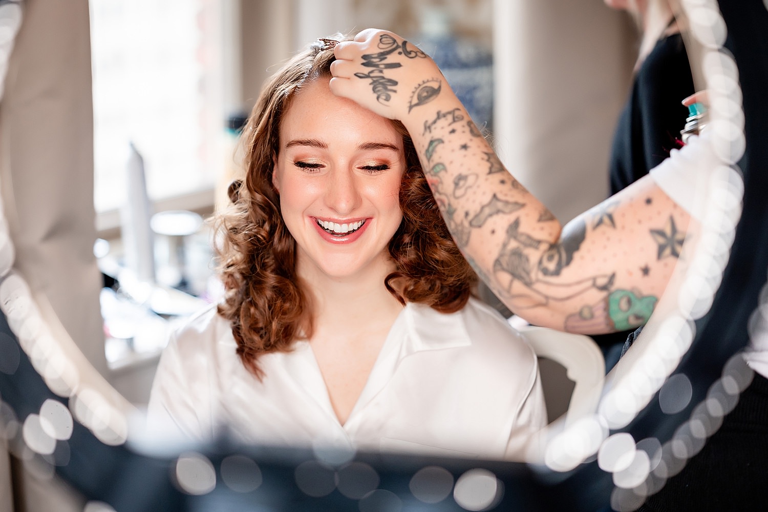 bride with ring light and makeup artist on wedding day • Love at First Sight: Wedding at the Omni William Penn and St Rosalia Church