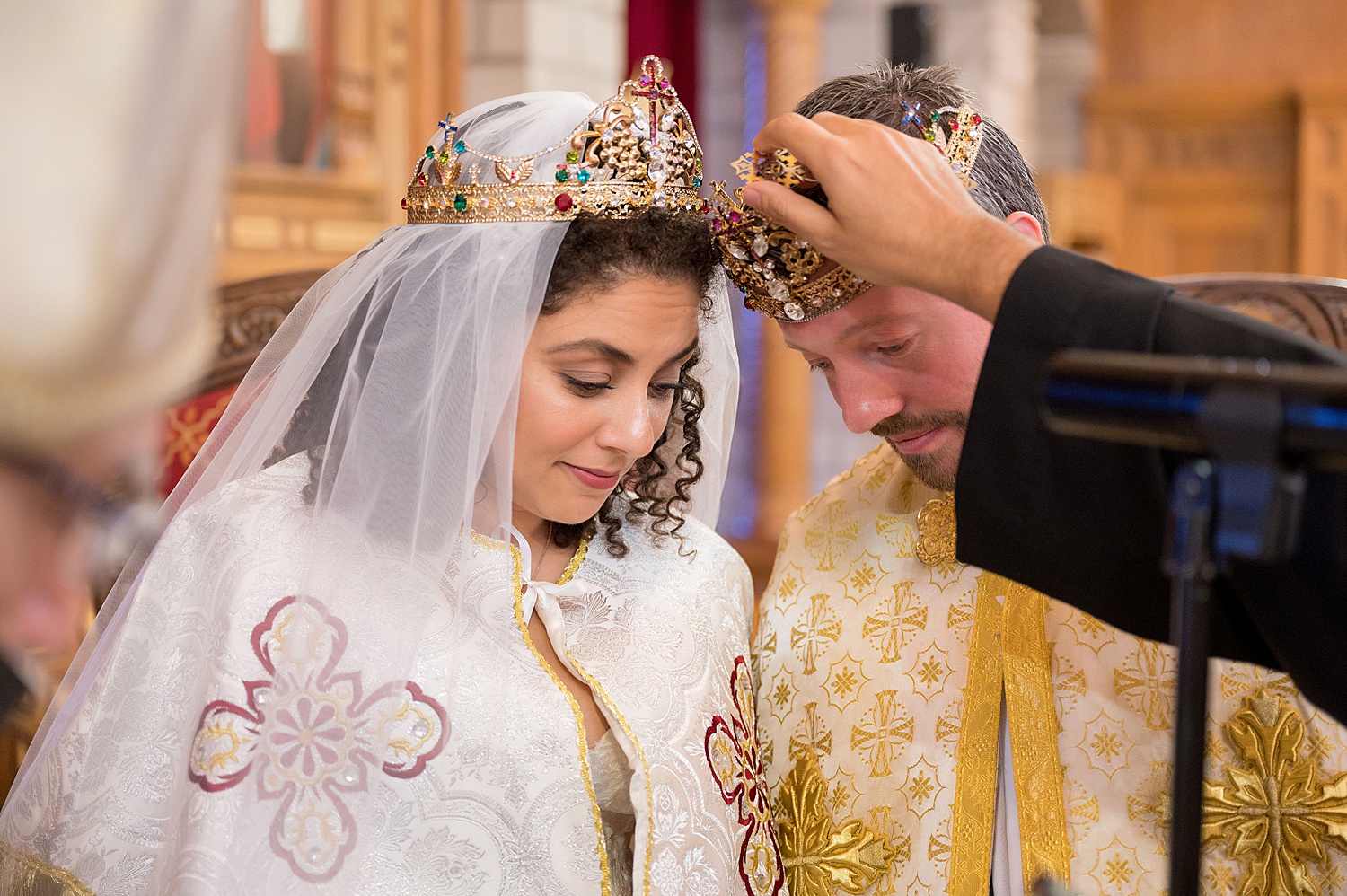 Crowning ceremony in a Coptic Orthodox Wedding in Pittsburgh • Coptic Orthodox Ceremony: How to Photograph a Wedding at St Mary's Church in Ambridge Pittsburgh
