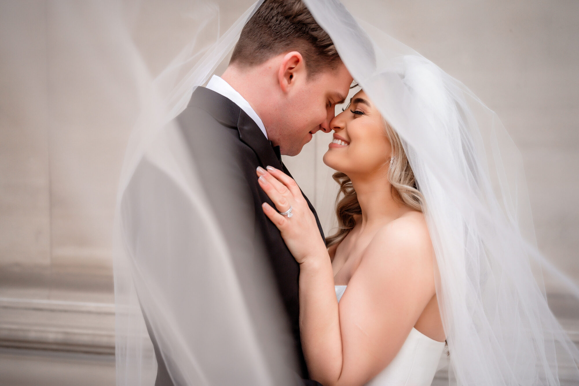 bride and groom under veil • Stunning Duquesne Club Wedding Photos - An Elegant Wintery January Pittsburgh Marriage