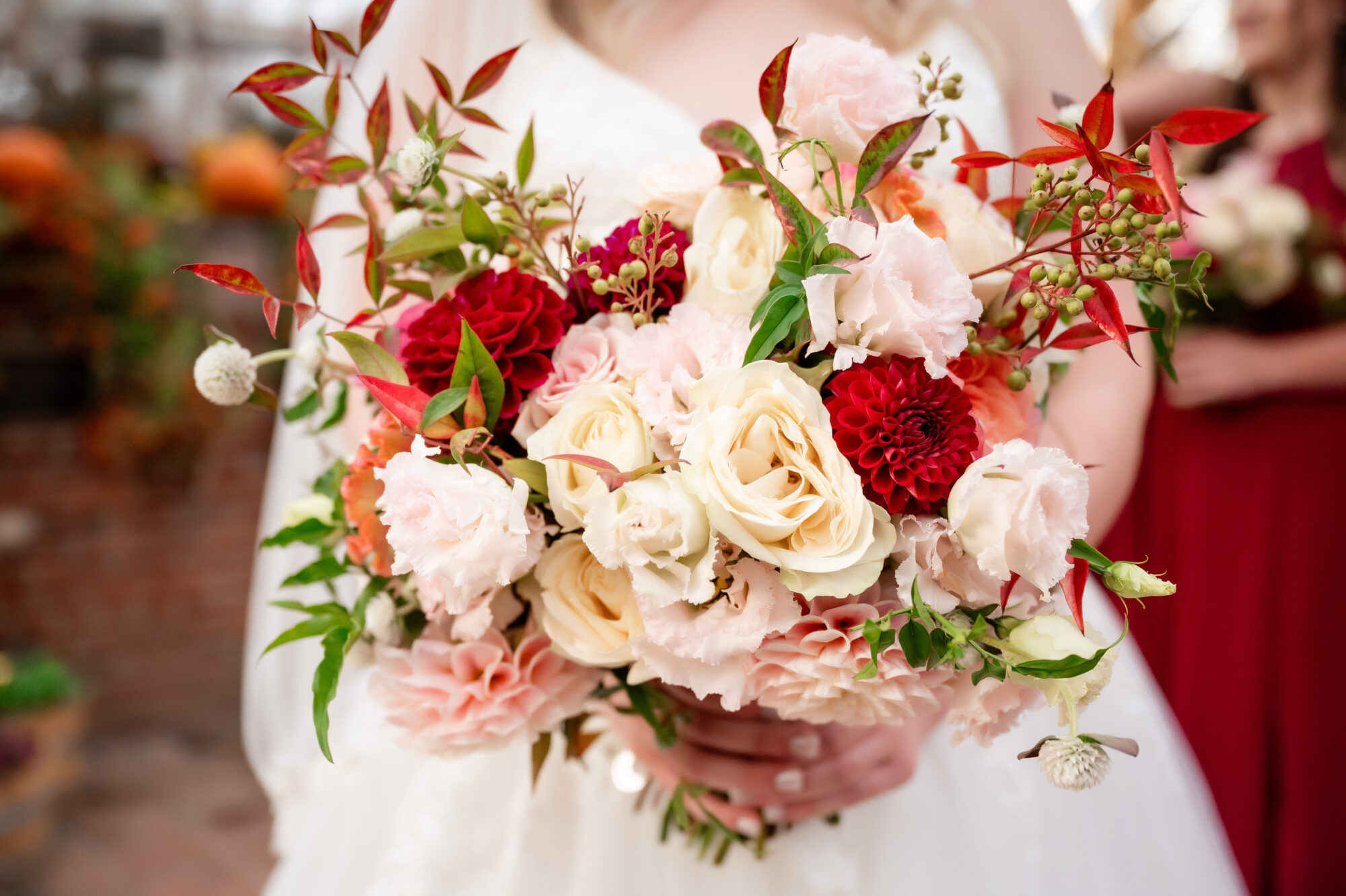 Pittsburgh florist Bramble & Blossom showcases a stunning arrangement of wedding flowers with a mix of vibrant blooms and delicate foliage. • Pittsburgh Wedding Florist - Bramble & Blossom Beautiful and Sustainable Flowers